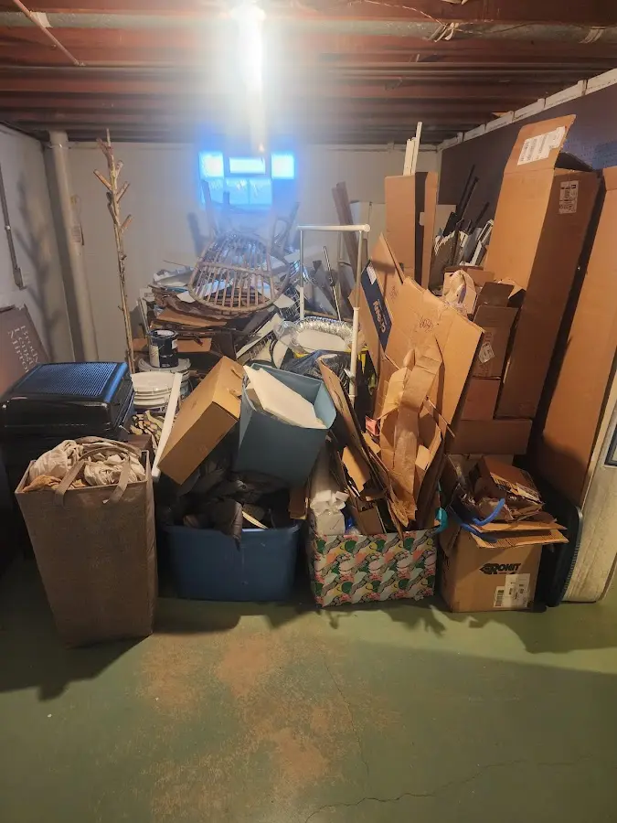 Roll-off dumpster container at job site for 6 Yard Dumpster Rental in Birch Run